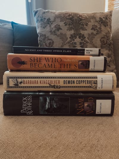 Finally returned books that were just languishing on my shelf for months. Came home with some more books. Help.